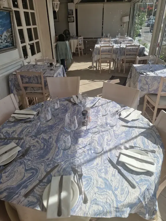Tal-Familja dining area set for guests